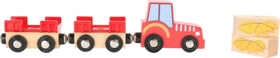 Image du tracteur avec la remorque et les bottes de foin magnétiques